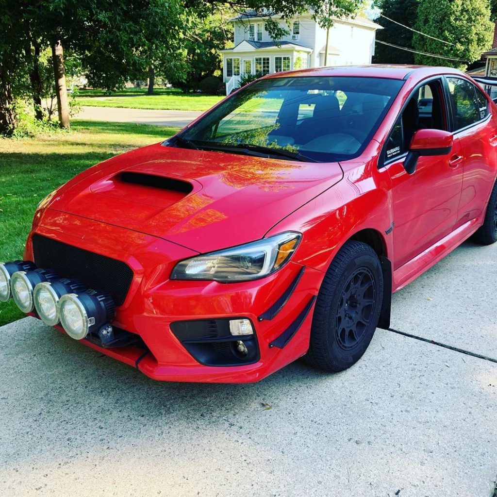 lifted subaru wrx rally car