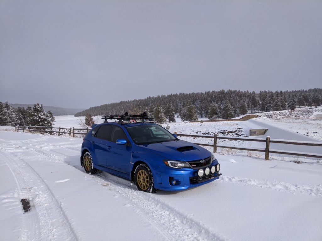 lifted wrx hatch with off road tires and method wheels