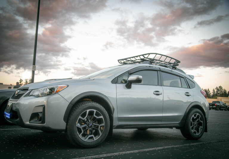 lifted subaru crosstrek with a thule roof basket