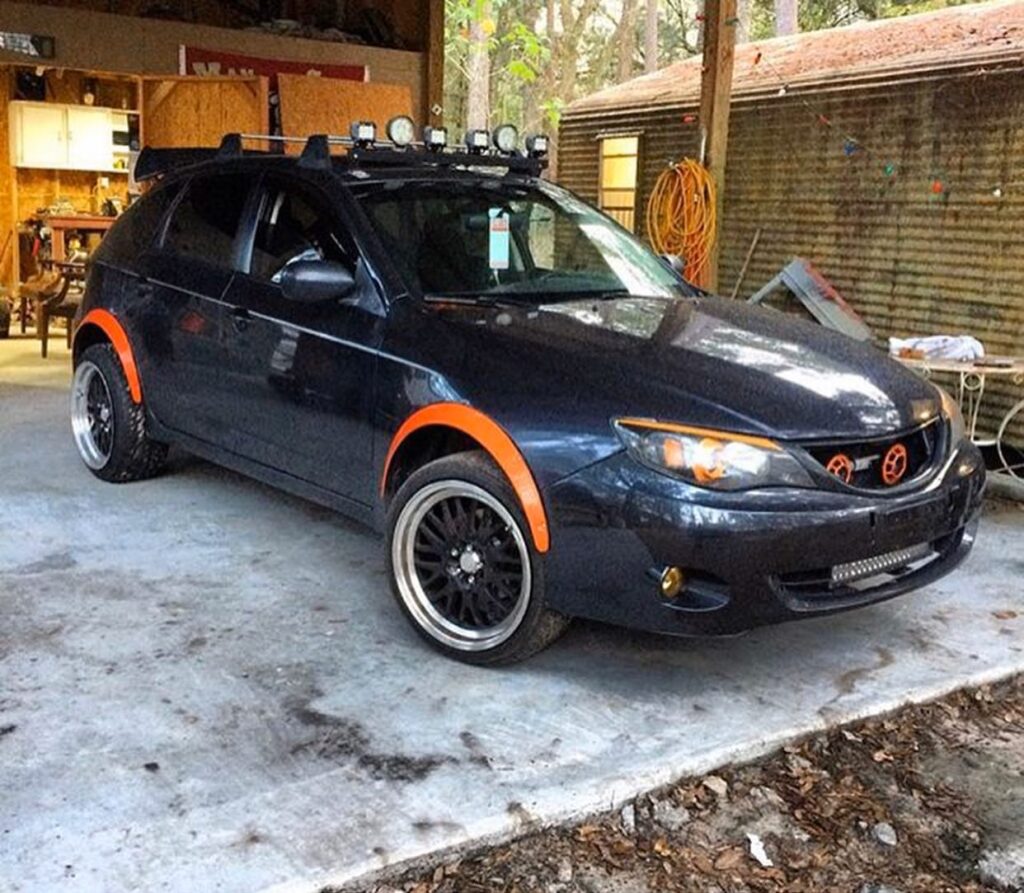 Subaru Impreza with basic ebay lift kit installed