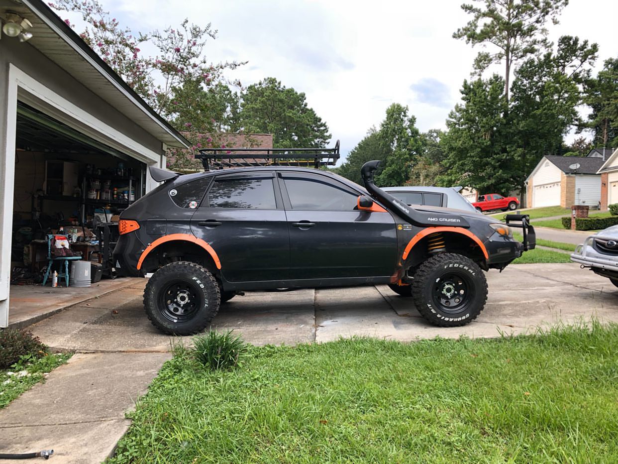 Lifted subarau impreza with a LS swap custom fabricated snorkel