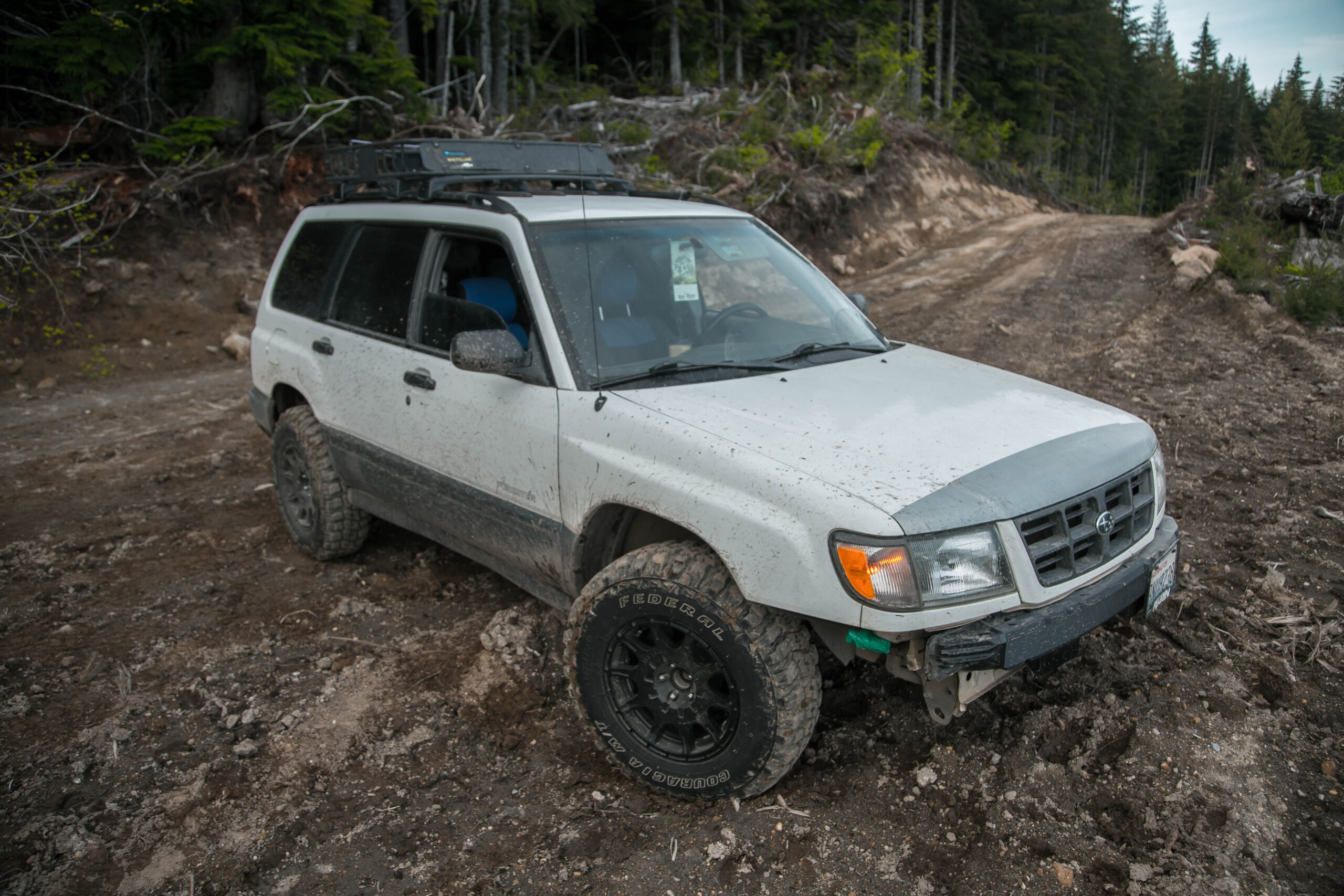 Subaru forester with a lift kit on federal couragia mt tires and method race wheels