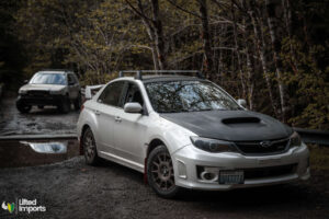 2013 lifted subaru wrx with off road tires and carbon fiber hood