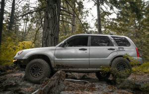 lifted silver 2006 subaru forester offroad