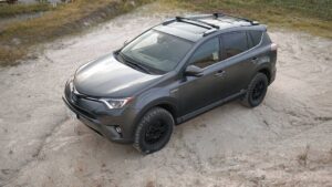 lifted toyota rav4 with off road tires and lift kit