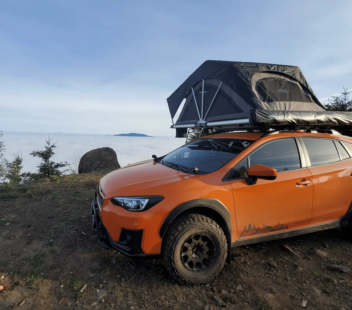 Subaru-crosstrek-lifted-in-orange-with-roof-tent