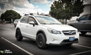 lifted 2014 subaru crosstrek XV with cooper off road tires and method MR502 race wheels and a 2 inch lift kit