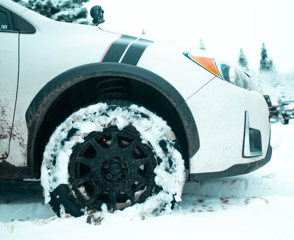 subaru crosstrek with snow tires and method mr502 wheels