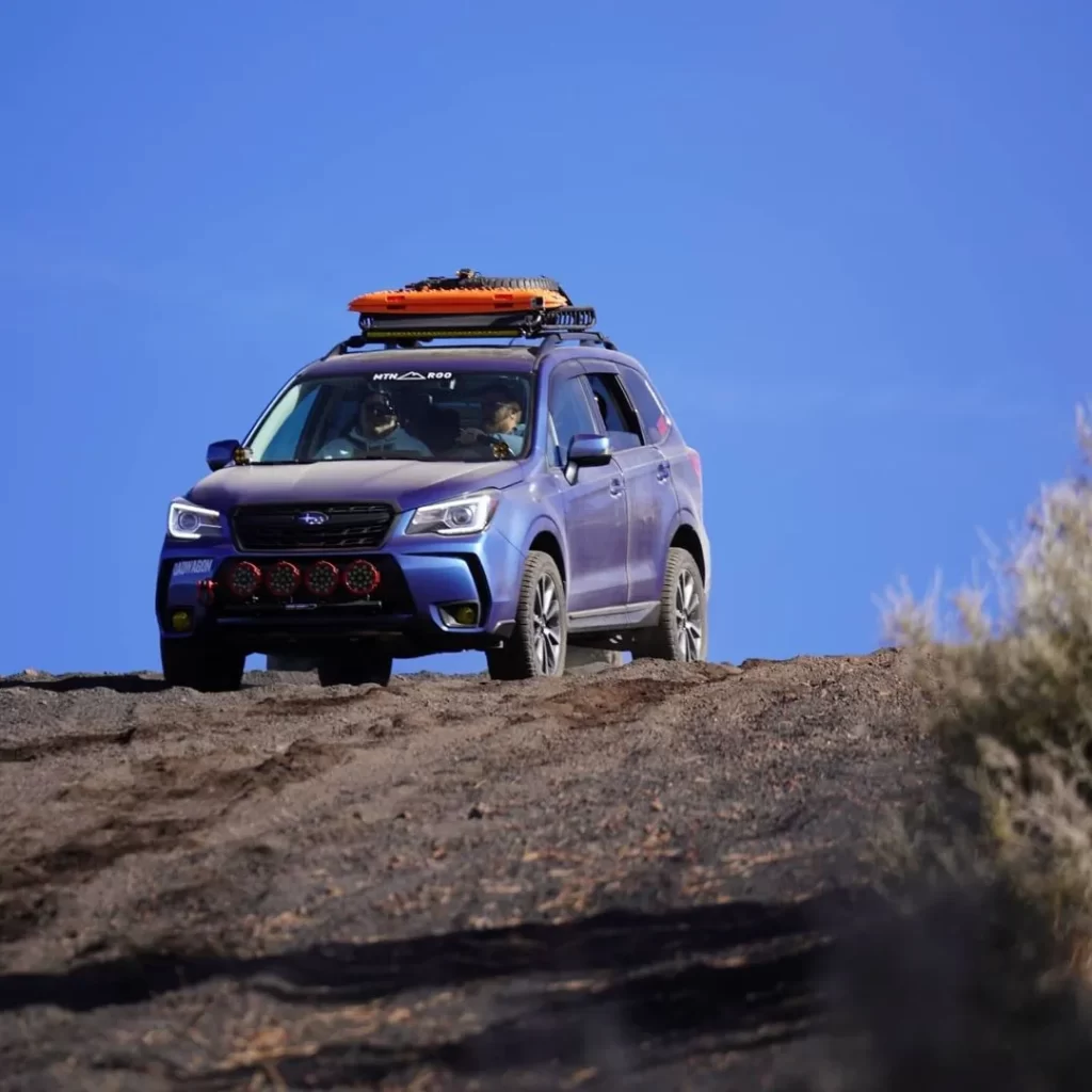 blue lifted forester xt 2017 on trails