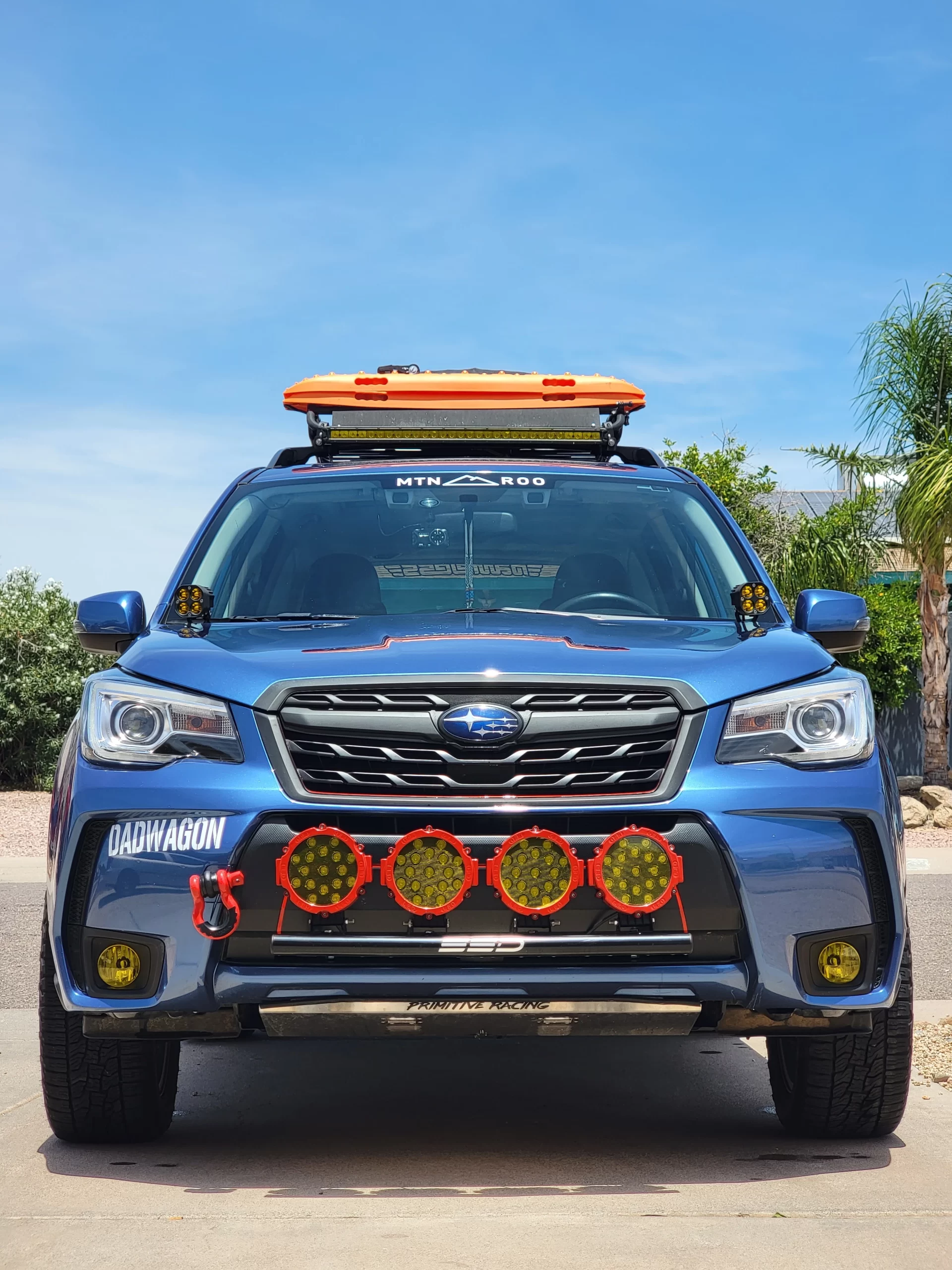 blue lifted forester xt 2017 with roof rack and rally light bar