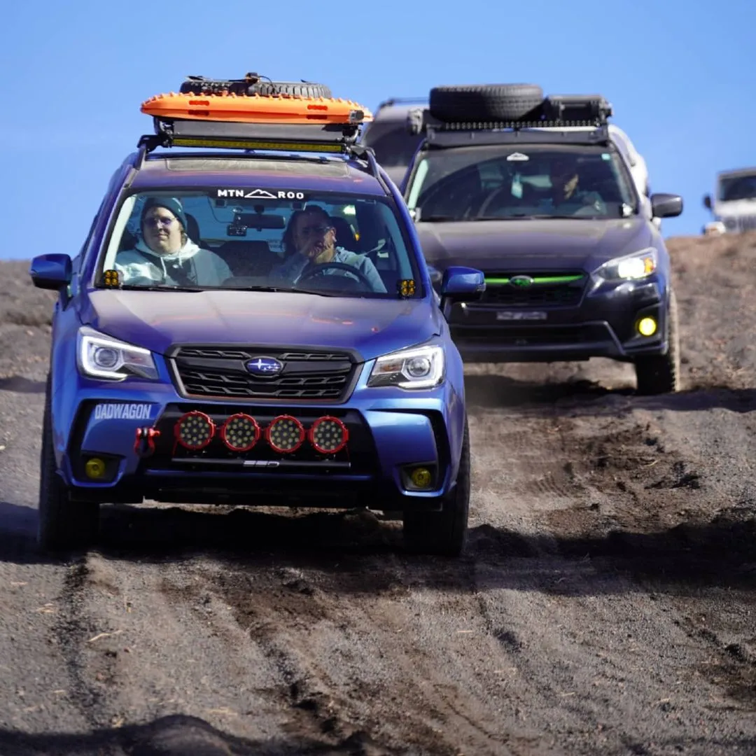 blue lifted forester xt 2017 with roof rack on trails