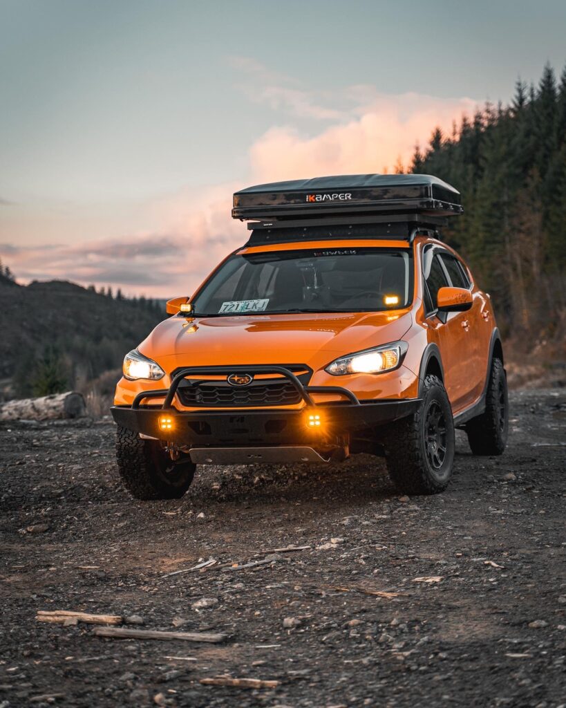 orange crosstrek with offroad ko2 tires