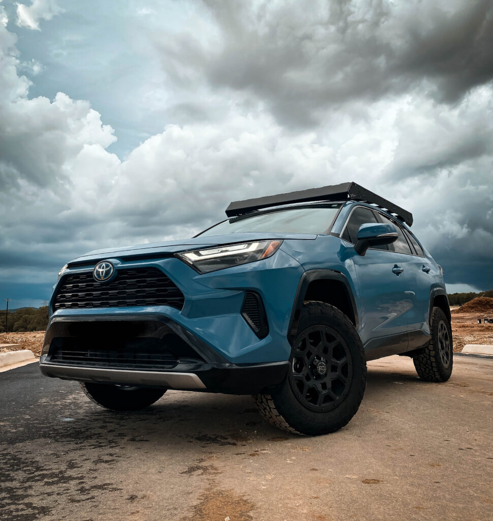 lifted 2022 rav4 hybrid with black rhino wheels and toyo open country tires