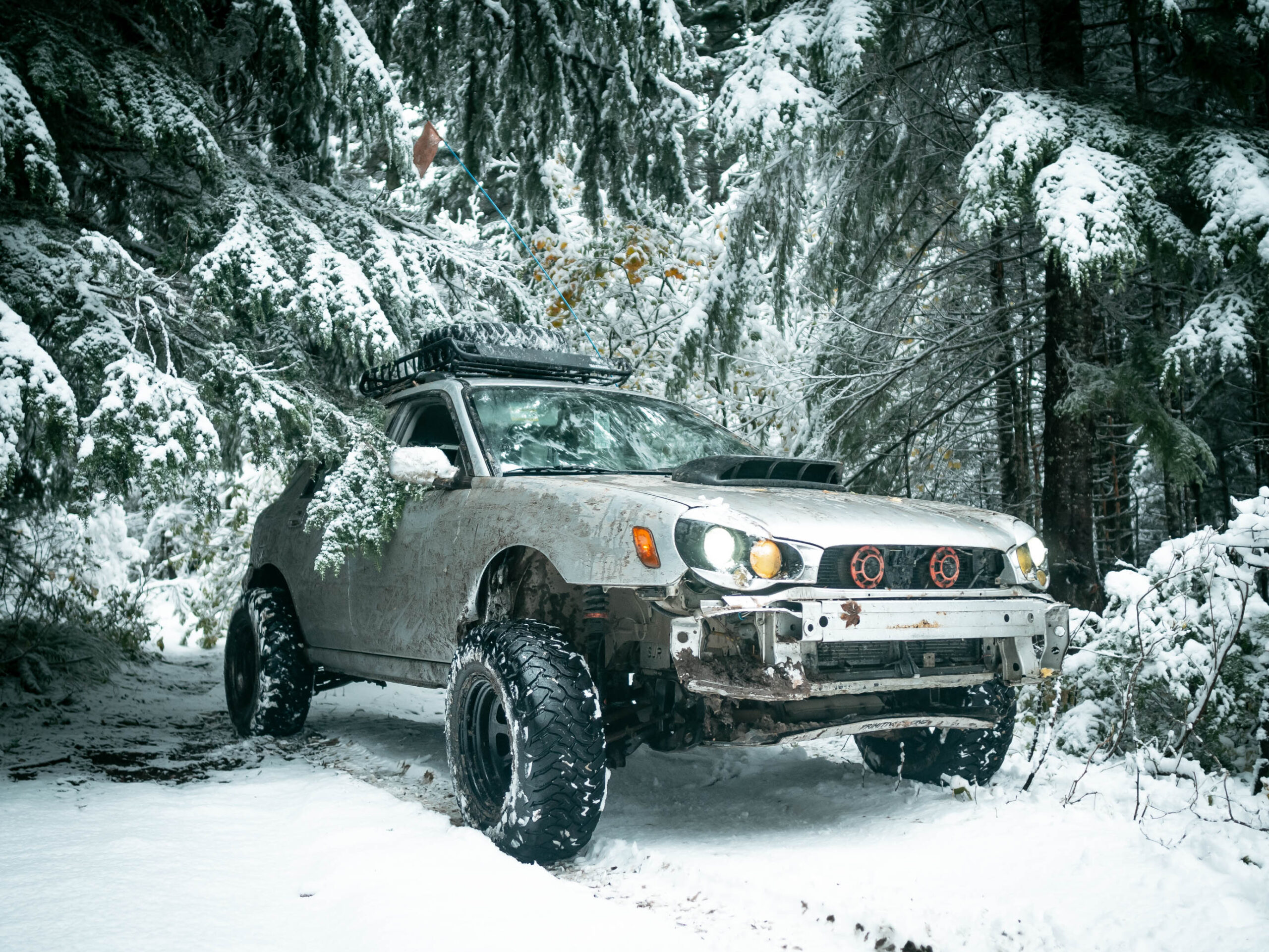 lifted subaru wrx offroad in snow