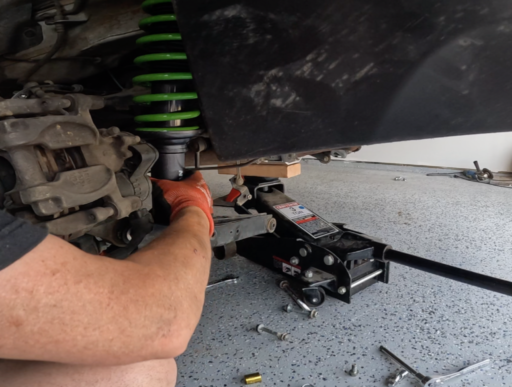 working on lifted subaru suspension installing ironman suspension lift