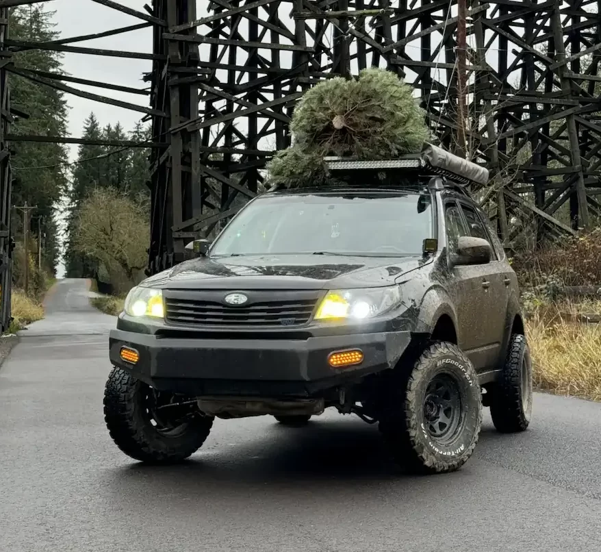 2010-subaru-forester-lifted-with-christmas-tree