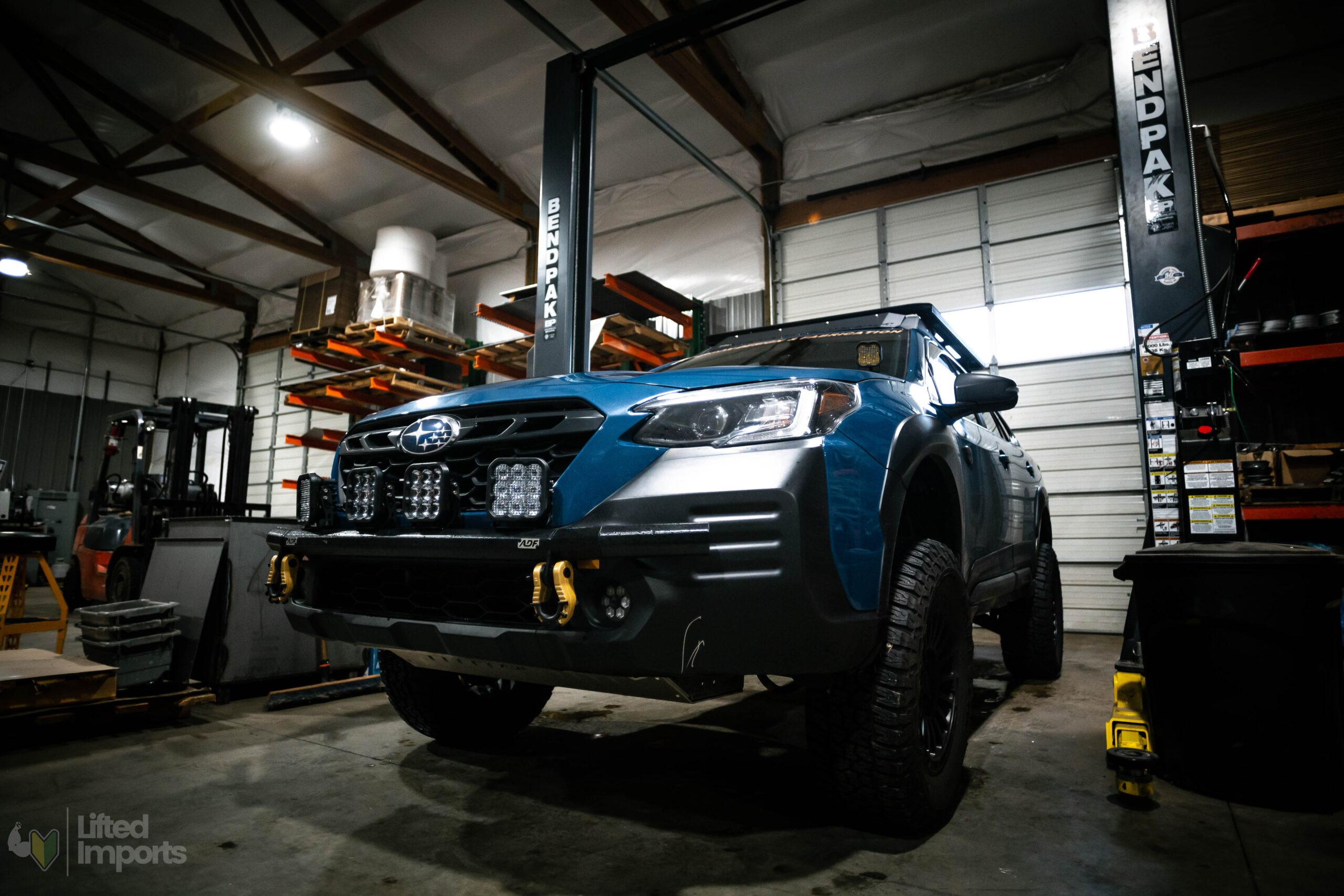 lifted subaru outback wilderness with roof rack