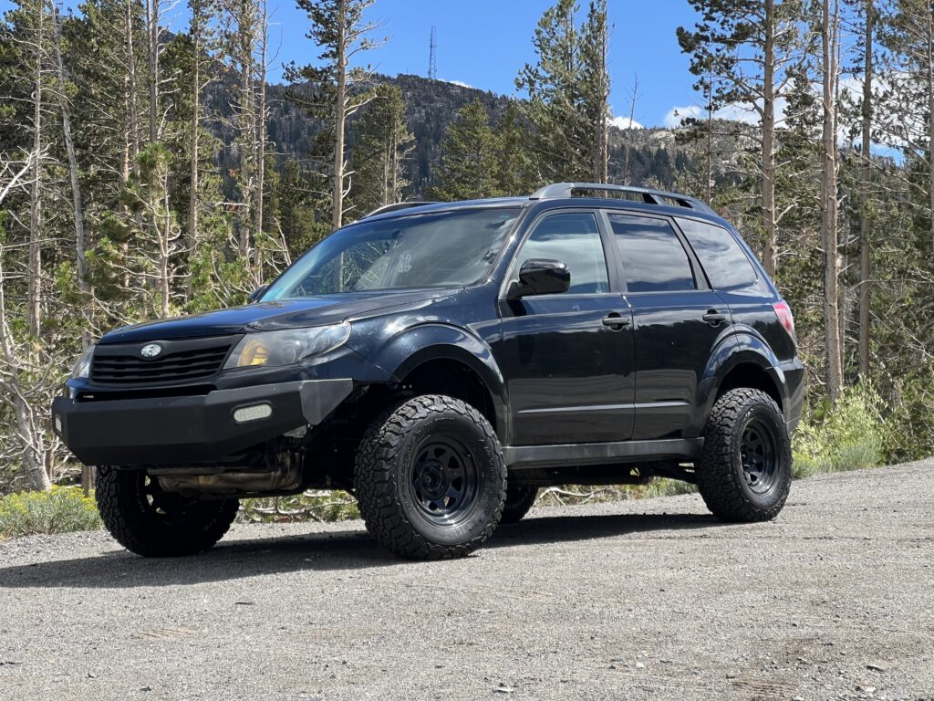 offroad subaru forester in the woods