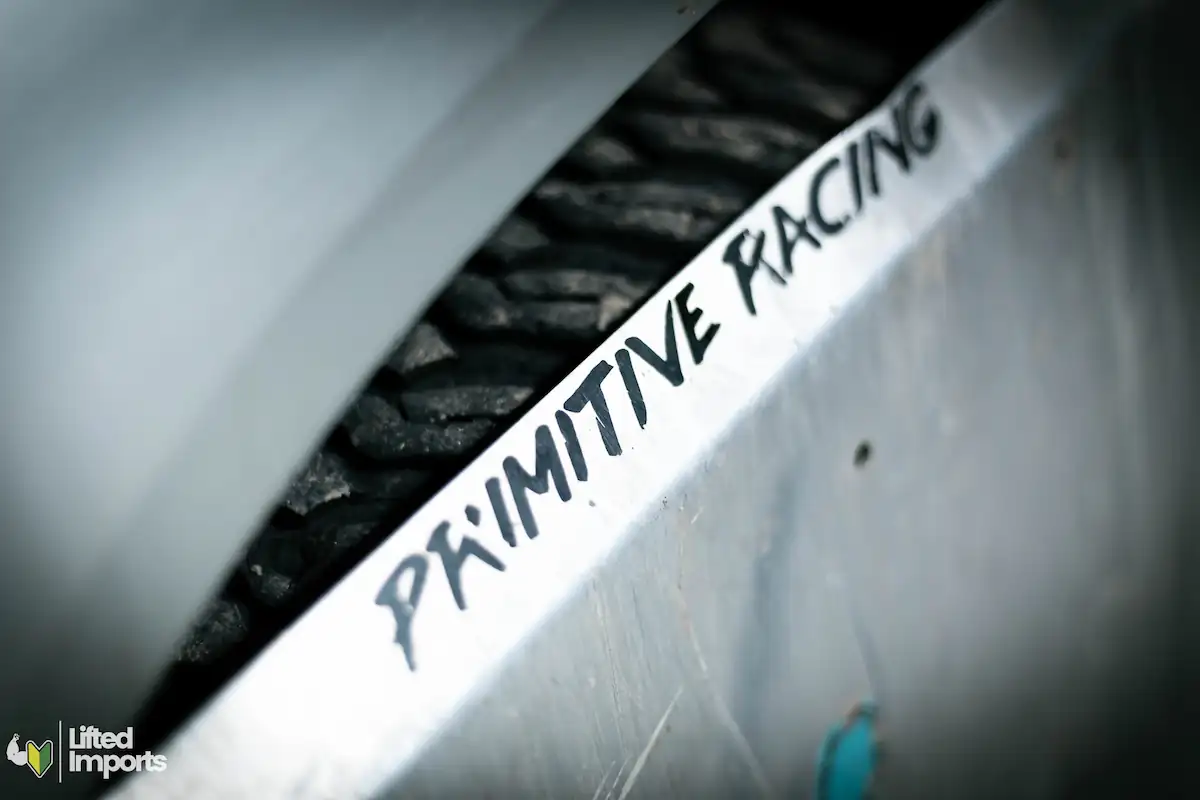 Subaru lifted primitive racing skid plate damaged