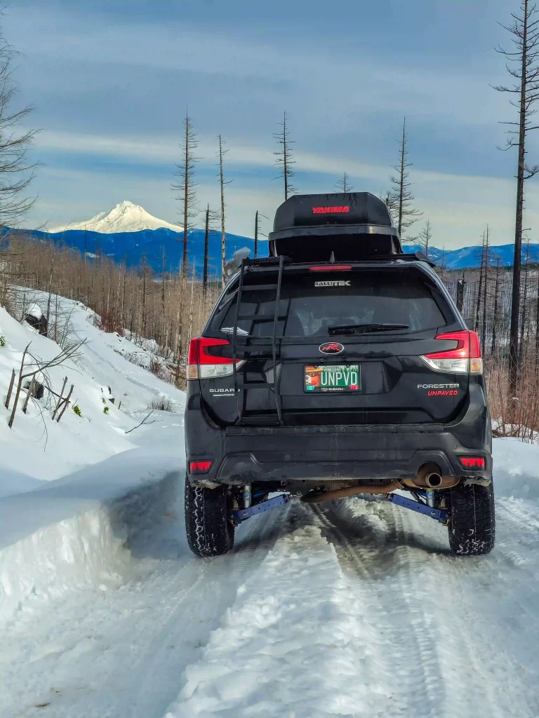 2021 Subaru forester offroad in the snow with rallitek lift kit and accessories