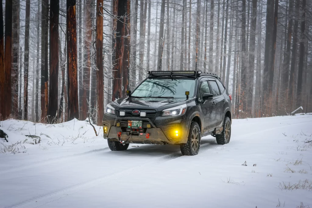lifted 2021 subaru forester in snowy forest
