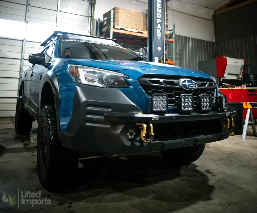 ADF blue subaru outback lifted 4 inches