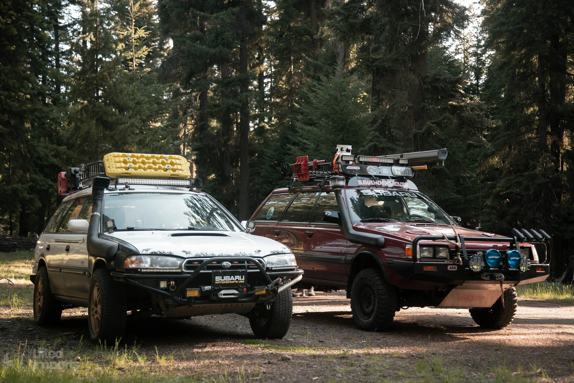 lifted subaru loyale and lifted subaru outback in the forest