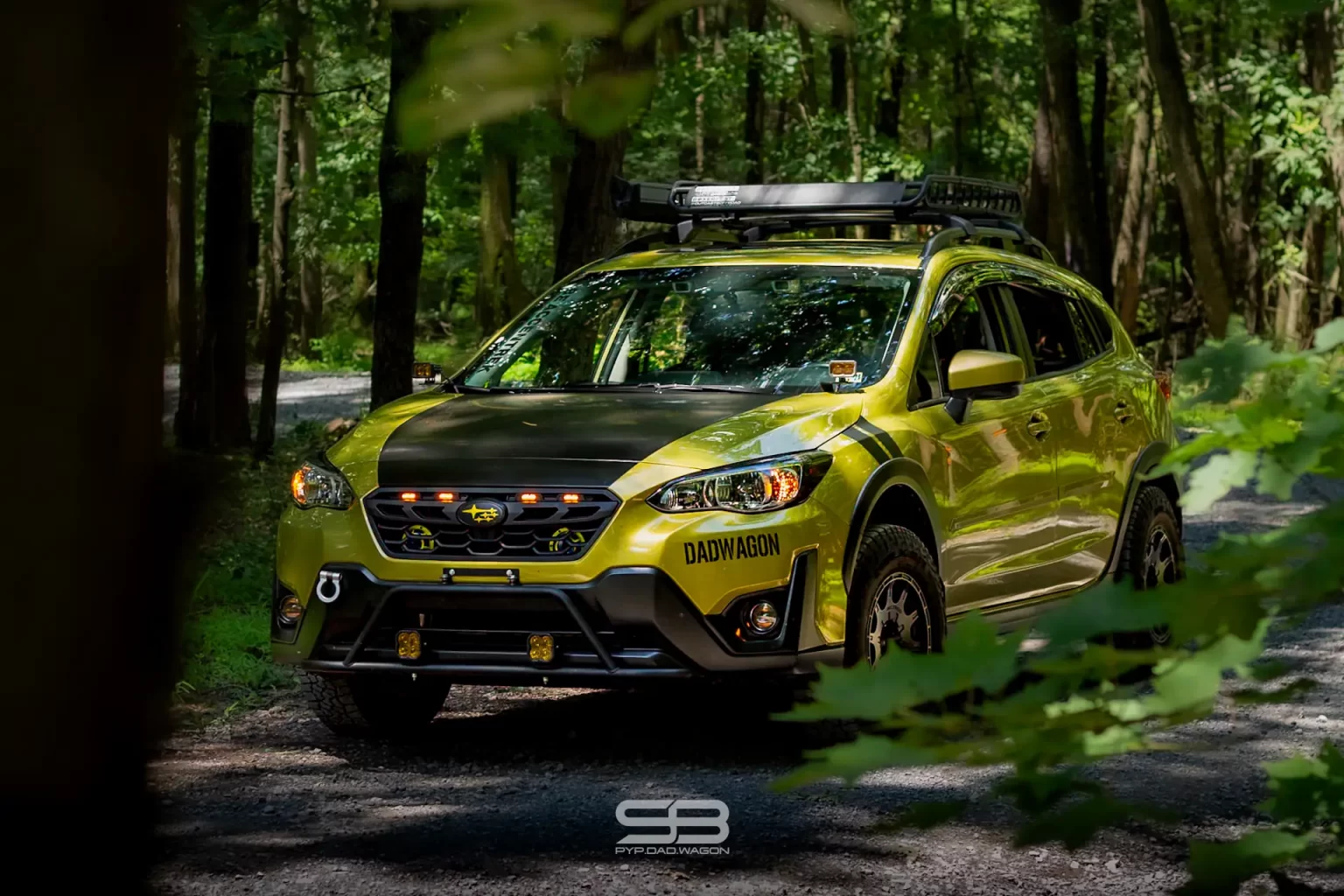 green subaru crosstrek build in forest