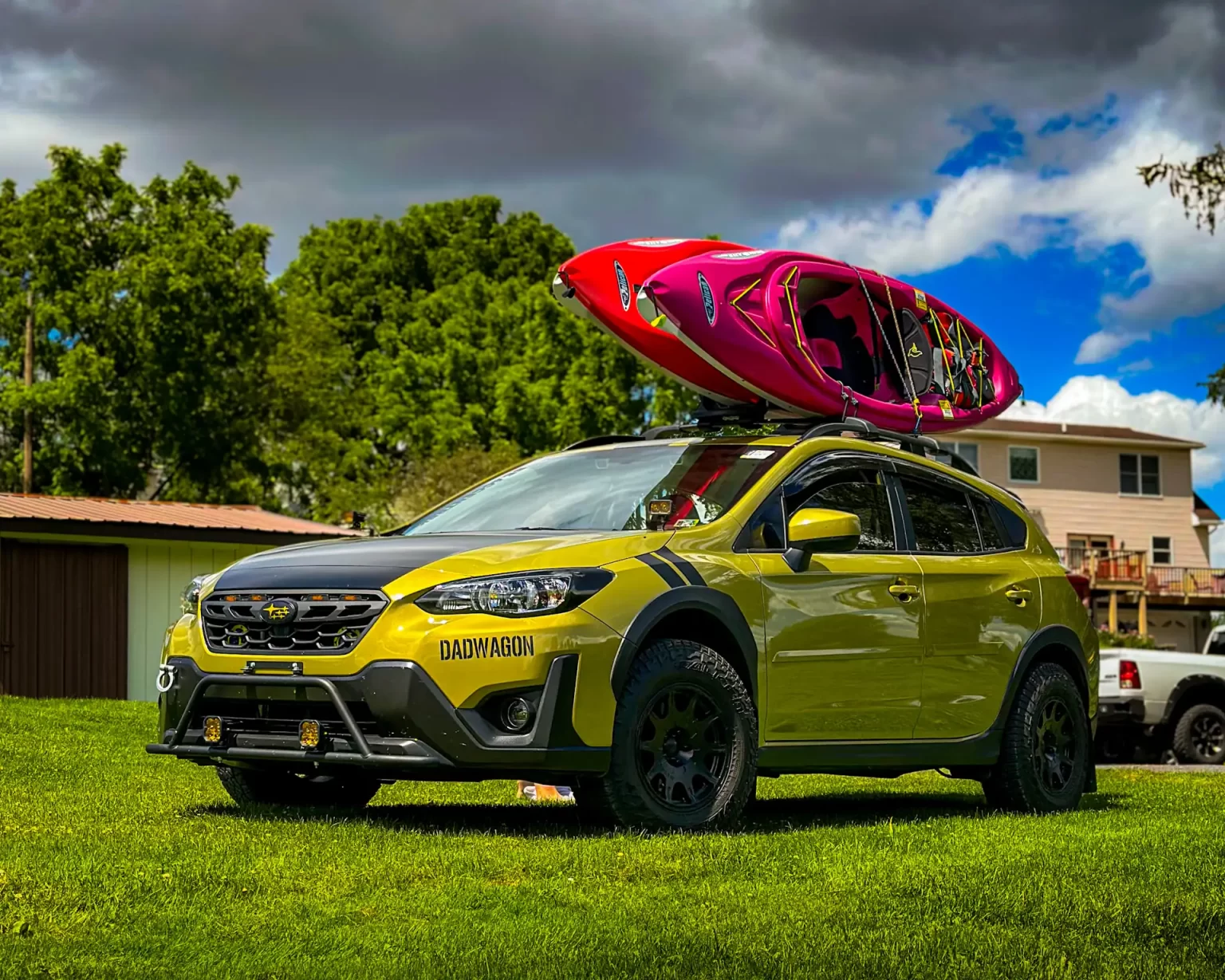 green subaru crosstrek build with kayak on roof