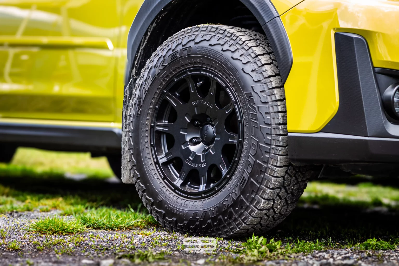 green subaru crosstrek build with method race wheels and falken tires